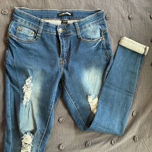 FashionNova distressed “hug the booty” skinny jeans. Size 5/6.